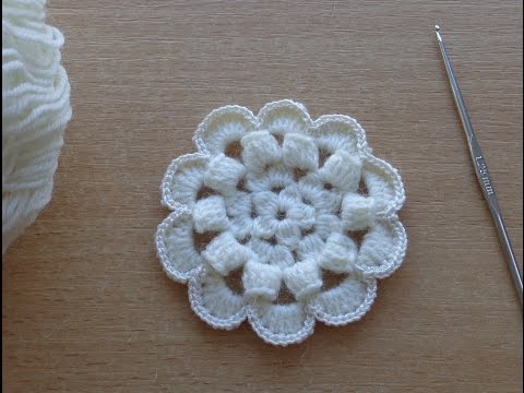 Видео: УРОКИ ВЯЗАНИЯ. Цветок вязаный крючком.