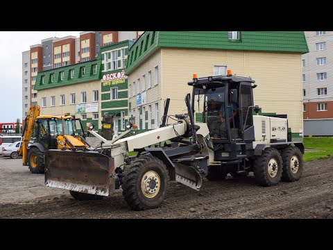 Видео: Грейдер ГС-14.02. Работа. Планировка дороги / Grader GS-14.02. Work. Road layout.