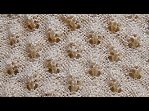 Видео: Объемный ажурный узор Вязание спицами Видеоурок 252