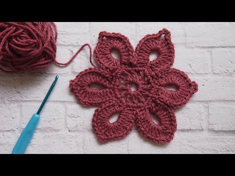 Видео: Как связать цветок крючком.Супер простой мотив для начинающих  Урок 276   How to crochet a flower