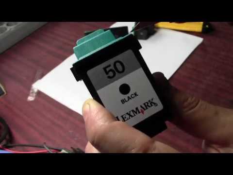 Видео: Прочистка струйного картриджа,как вскрыть крышку картриджа