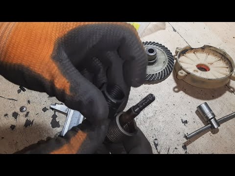 Видео: электропила - замена торсионной пружины