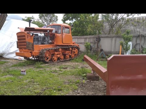 Видео: Установка бульдозерного отвала на ДТ-75 (третья часть)...