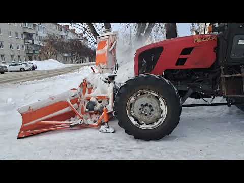 Видео: мтз 92п шнекоротор 1 часть