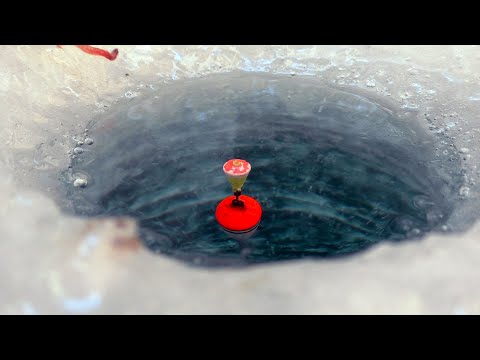 Видео: Рыбалка на поплавок зимой на водохранилище . Рыбалка после снегопадов и оттепели.