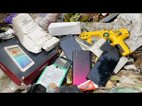 Видео: Ищем подержанные телефоны в мусорном баке у реки || Восстановление разбитого Vivo V15