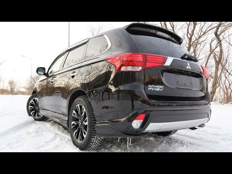 Видео: Mitsubishi Outlander PHEV 2016 - Какие проблемы? Стоит ли покупать заряжаемый SUV