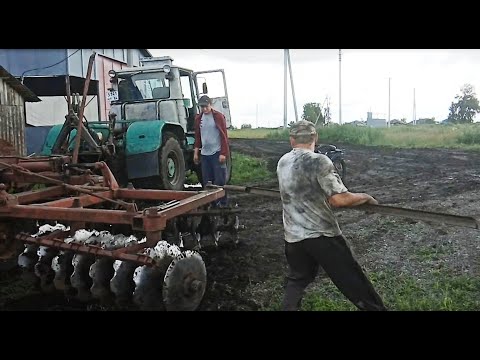 Видео: Трактор Т-150К тянет тяжелую борону БДТ-7. #26 Ремонт комбайнов.
