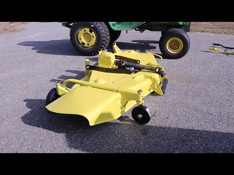 Видео: Ремонт деки газонокосилки John Deere 400 60 дюймов
