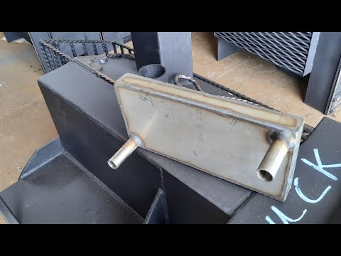 Видео: Печь банная "ФЛАГМАН" с подключением к ДУШУ. Печь с теплообменником. Для бани 6х6 из ТРЕХ ОТДЕЛЕНИЙ.