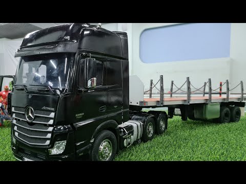 Видео: Радиоуправляемый тягач Mercedes-Benz Actros 3363 GigaSpace от Tamiya 1/14 с прицепом Hercules Hobby