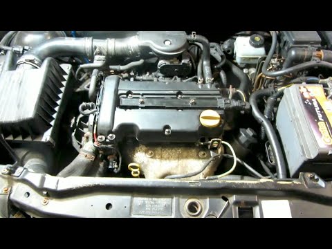 Видео: Как заменить прокладку клапанной крышки Opel Astra G.