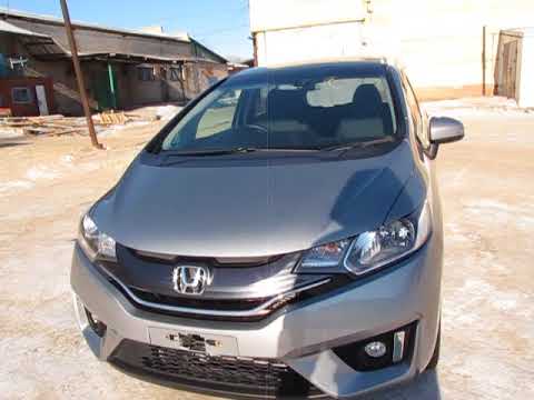 Видео: Обзор Honda Fit 2014 г кузов GK3 плюсы и минусы