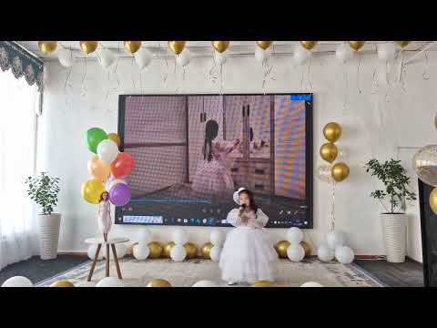 Видео: Қуыршағым әні. Орындаған: Мұқаш Жібек Жетекшісі:Асарова Бахыт