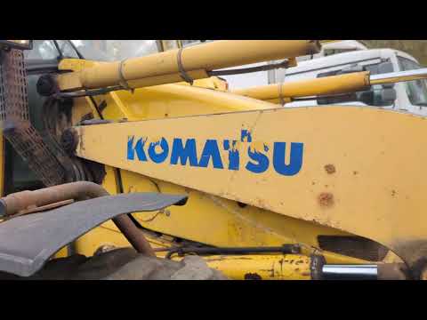 Видео: Б/у экскаватор-погрузчик Komatsu WB97S-2. 2003 г.в. 13000 м*ч
