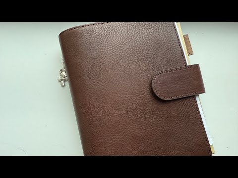 Видео: Распаковка обложки Moterm Franklin Covey FCC Elite (эспрессо-дюна)