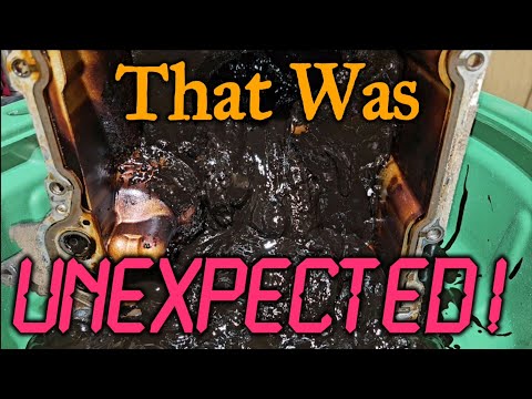 Видео: 5.3 Снятие масляного поддона раскрывает грязный секрет!!!