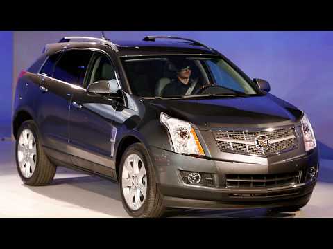 Видео: Cadillac SRX 2011  замена штатных блоков ксенон на универсальные