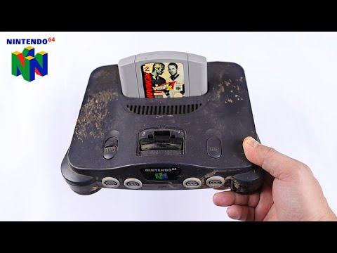 Видео: Восстановление сломанной Nintendo 64 - Восстановление и ремонт ретро-консоли - ASMR