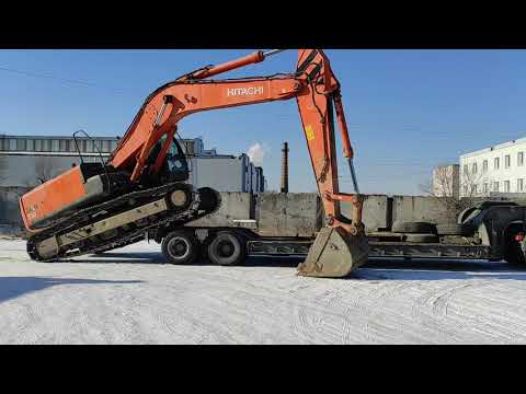 Видео: ПОГРУЗКА ЭКСКАВАТОРА ХИТАЧИ 330 НА ТРАЛ