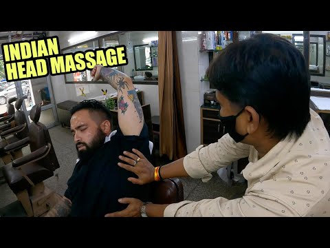 Видео: БЕЗУМНЫЙ индийский массаж головы в Нью-Дели, Индия 🇮🇳 (всего 2 доллара + хруст в шее)