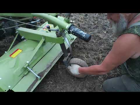 Видео: Тюнинг тяжелого дизельного мотоблока. Замена колеса на активной фрезе  и пахота с новым колесом.