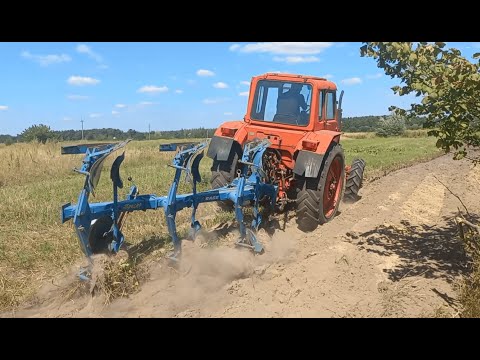 Видео: 3-корпусний оборотний плуг Rabe Werk з трактором МТЗ-82 в роботі