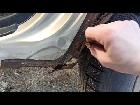 Видео: SUZUKI GRAND VITARA 2006, сгнил до дыр через полтора года после обработки официалов