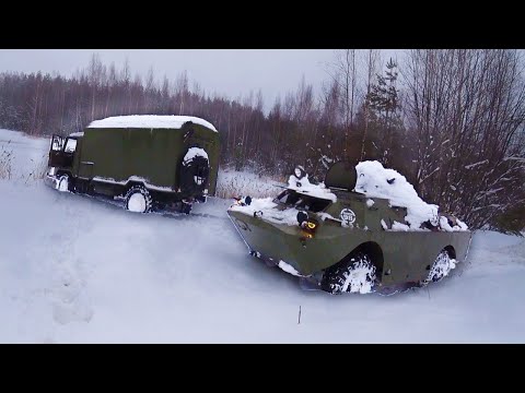 Видео: БРДМ 2 и ГАЗ 66 увязли в глубоком снегу