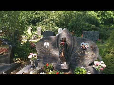 Видео: Кладбище в Германии цветы свечи  скромно тихо  дорого