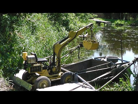 Видео: очистка водоёма мини экскаватором