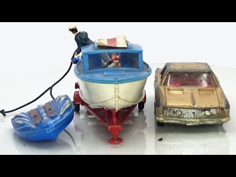 Видео: Corgi Giftset 31 Restoration. Очень редкий набор Buick Riviera с лодкой Dolphin.