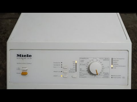 Видео: Стиральная машина Miele Novotronic W 149.Клинит барабан.Меняем крестовину