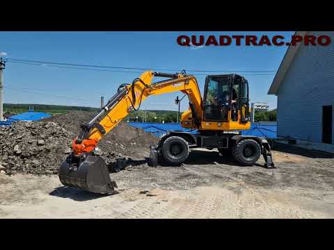 Видео: Тест клиентами колесного полноповоротного экскаватора QUADTRAC E90W +7-909-630-90-90