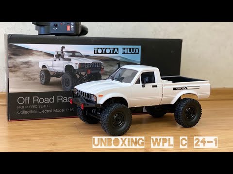 Видео: WPL C24-1 распаковка и обзор бюджетного краулера! | Toyota Hilux в масштабе 1:16