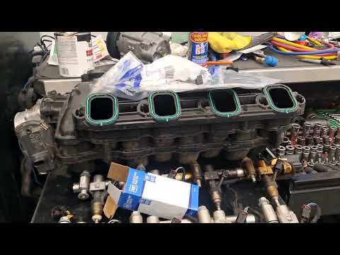 Видео: Пропуски зажигания в двигателе Silverado 2014 года, вызванные пробитым уплотнением форсунки GDI, ...