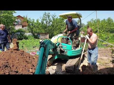 Видео: Земельные работы с помощью Японского Миниэкскаватора.