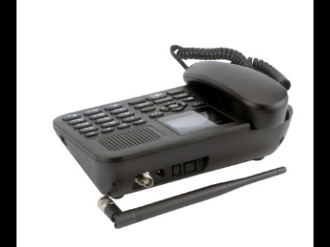 Видео: Новый недорогой стационарный gsm телефон с цветным экраном