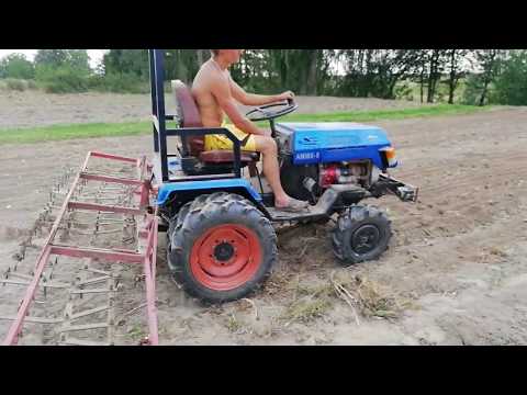 Видео: Боронование минитрактором амжк-8