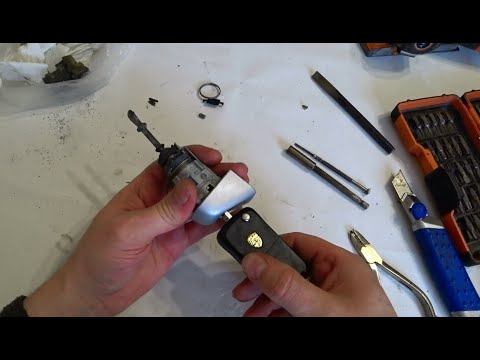 Видео: Как поменять старую на новую личинку замка водительской двери Cayenne [Кайен] & Touareg [Туарег]?