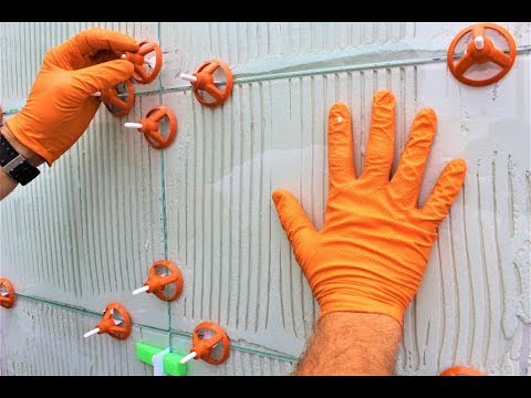 Видео: Как использовать систему выравнивания плитки для стен