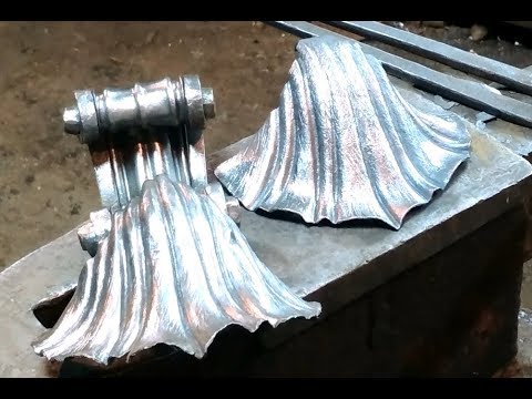 Видео: Кованая ракушка, возобновление ковки винного шкафа