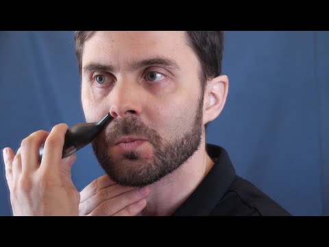 Видео: Универсальный триммер для носа, ушей, бороды и усов
