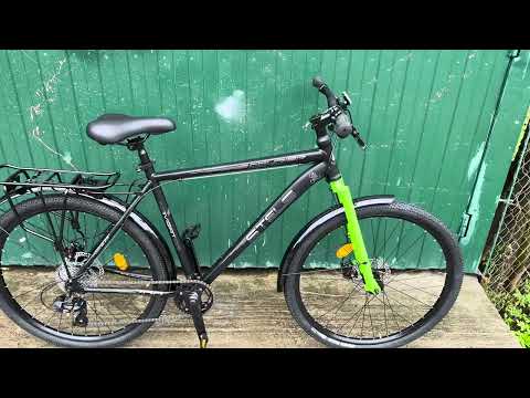 Видео: STELS Navigator 700 Z010 - велосипед Стелс Курьер - особенности этой модели и особенности сборки