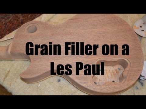 Видео: Наполнитель для гитары Les Paul. Как наполнить красное дерево