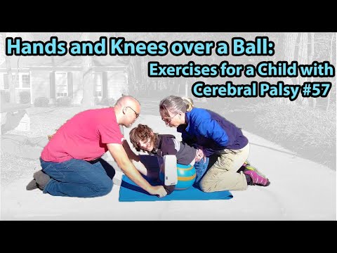 Видео: # 57 Руки и колени над мячом: упражнения для ребенка с церебральным параличом