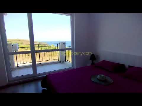 Видео: Двустаен с гледка море, плаж, град и планина!
