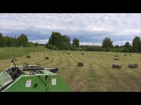 Видео: Прессуем сено, Собираем рулоны.