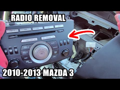 Видео: Mazda 3 2010-2013: снятие магнитолы — пошаговое руководство