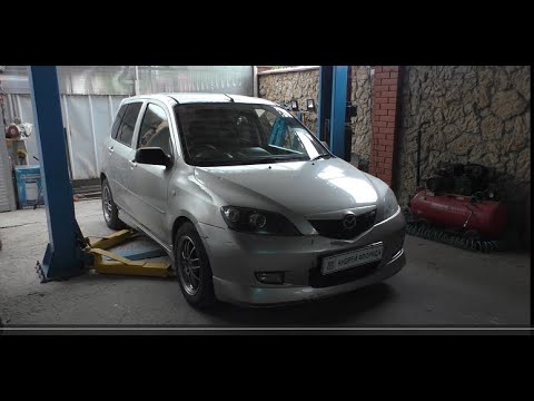 Видео: Замена топливного фильтра на Мазда 2 1,6 Mazda 2 2004 года